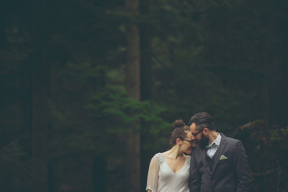 bride and groom in scottish countyside